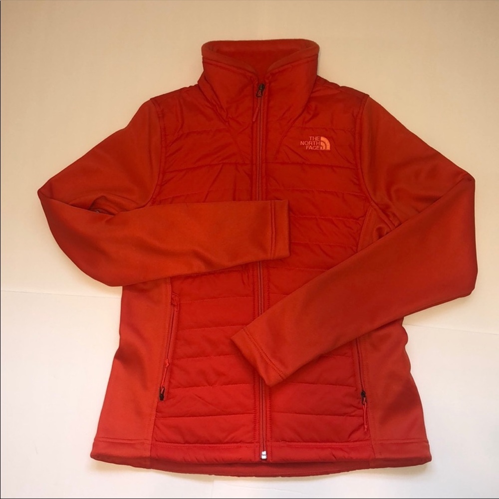 The North face bright red/orange zip up jacket